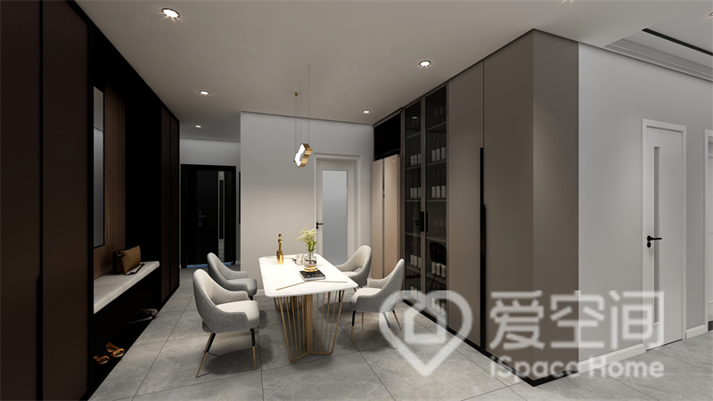 餐厅简约自得，背景墙与家具色调和谐统一，雅致有格调，时尚灯具点缀空间，添加了些许层次感。