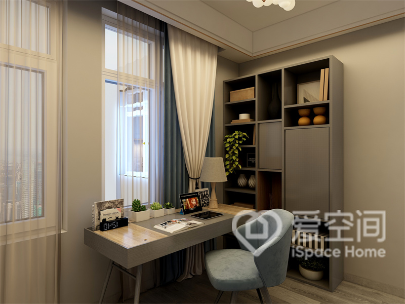 书房以低饱和灰咖色调展开水，不张扬的颜色令空间更显温柔沉稳，书柜尺度适宜，足以满足储物需求。