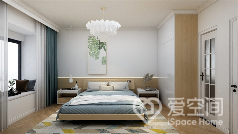 主卧配色简雅，木板上墙设计，床品、装饰画和灯具对空起到装饰的作用，整体美观而时尚。