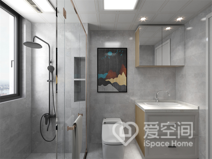 卫生间沿袭了简约格调，干湿分离给空间增添不少层次氛围，原木元素的融入增加了温馨感。