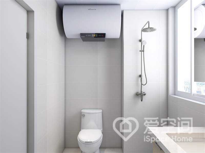 卫浴空间选用奶白色调为背景，塑造出安静的氛围，洁具有序布置，彰显出业主对高效生活的追逐。