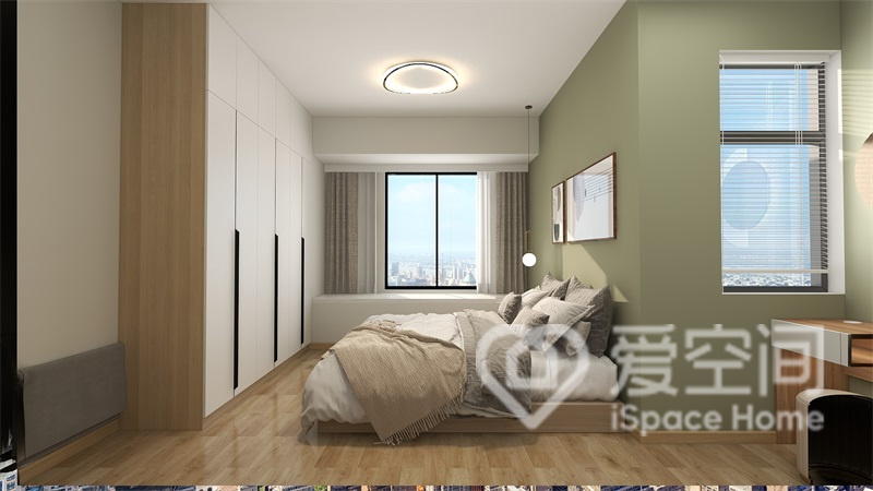 绿色与素色的搭配清新又跳跃，为卧室空间营造了自然清新氛围。
