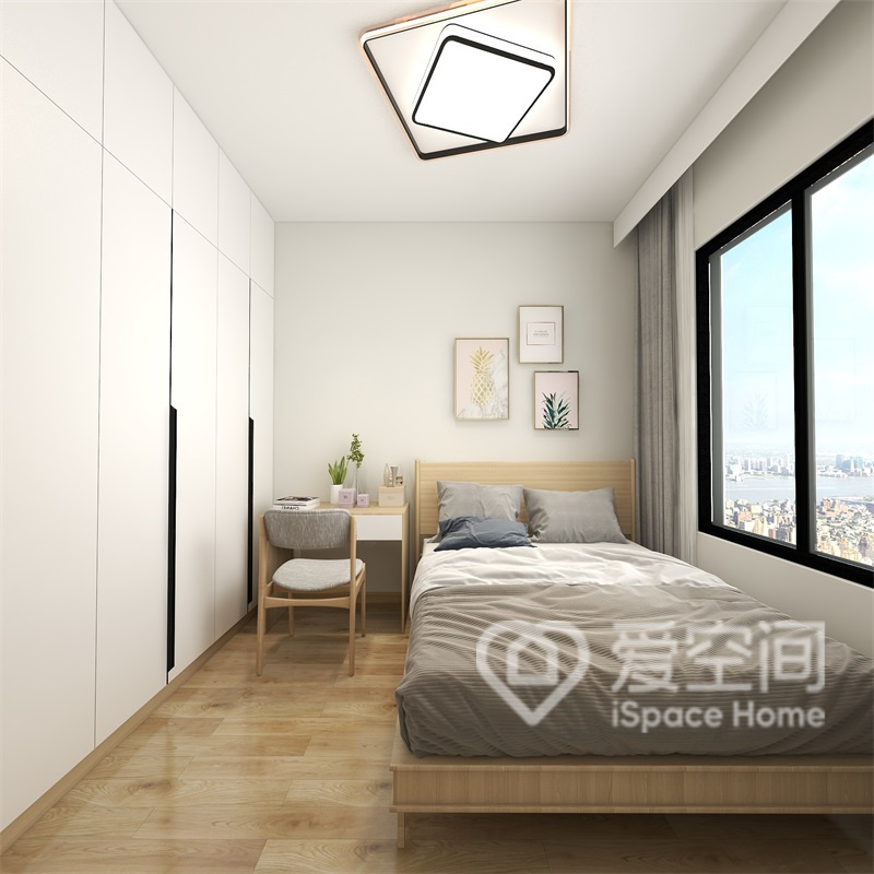 次卧借助单人床与书桌进行装饰，解决学习及客人居住的问题，实用性强。