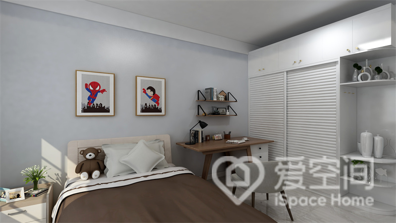 蓝白色背景墙令空间看上去很干净，设计师在床头增设了写字桌椅，提升了空间的实用功能。