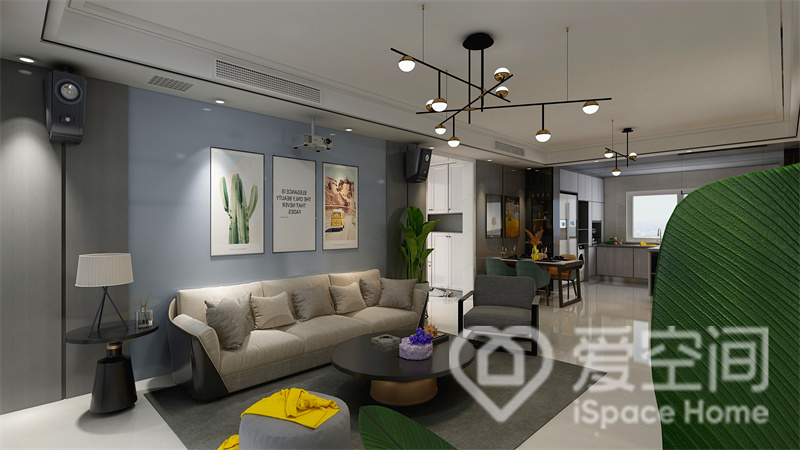 蓝色与米色的搭配下，客厅显得十分舒适，装饰画、灯具与绿植与整个空间的主题相呼应，令空间充满休闲气息。