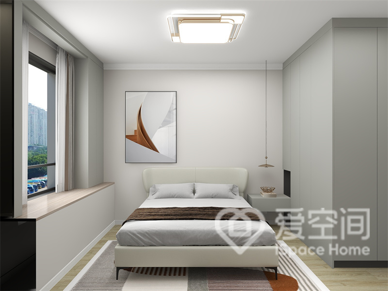主卧空间以白色为主，采用不同明暗的颜色做区分，一进门就能感受到舒适放松的氛围。