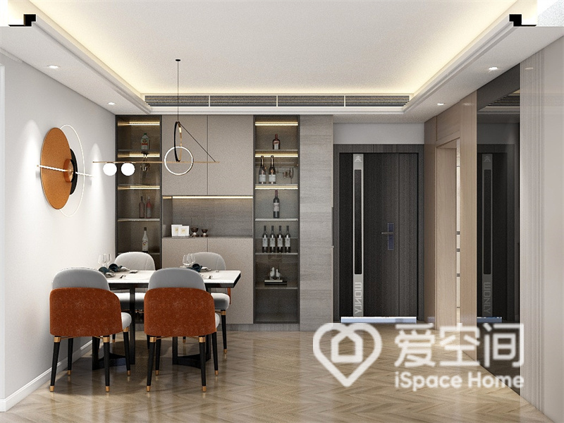 餐厅空间比较舒适，宽敞明亮，背景墙用简单的线条勾勒出线条美，满足了空间的收纳需求。