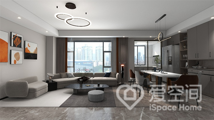 客厅空间中，设计师设计出宽阔的视觉感受，餐厅在客厅一侧，营造温馨简雅的用餐氛围。