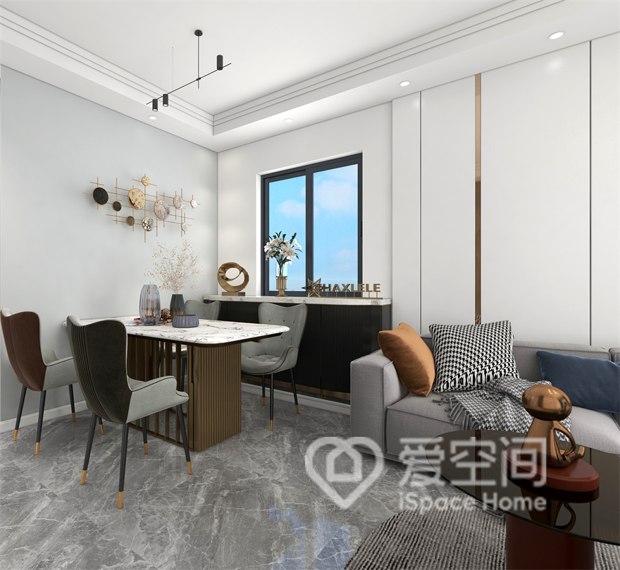 餐厅引入自然光线，带入都市质感的餐桌椅高级又耐看， 金属装饰让整个餐厅充满了时尚感，让人羡慕不已。
