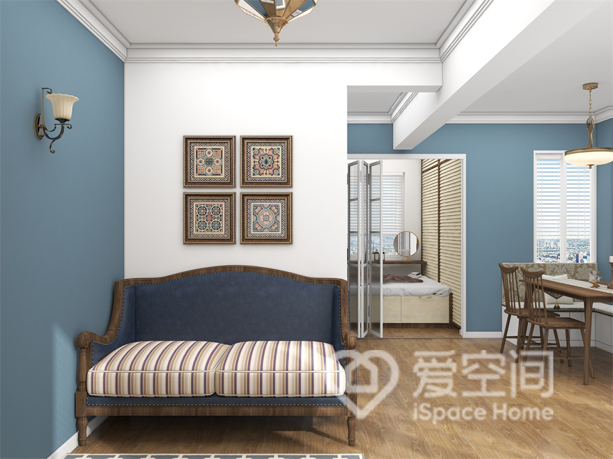 设计师利用休闲空间建设休闲区满足业主休闲、社交需求，蓝色背景、蓝色休闲椅都给人们营造温馨舒适的环境。