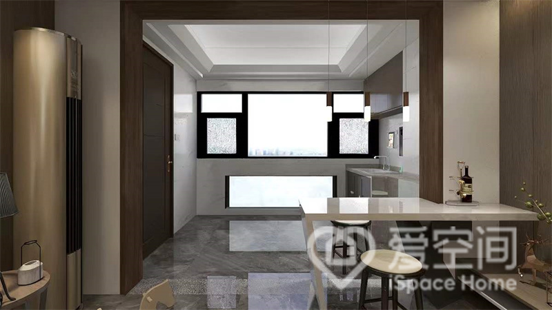 餐厅选用白色隔台做吧台，在不影响采光的基础上，令用餐空间显得更加的温馨、舒适、富有层次。